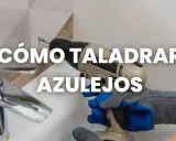 Mano con guantes usa taladro para taladrar azulejo.